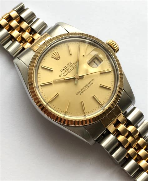 steel and gold rolex.